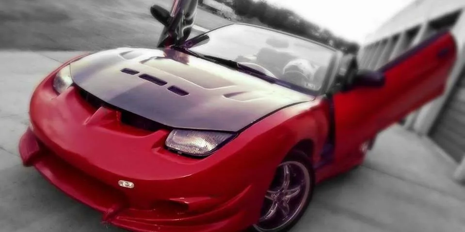 1996 Pontiac Sunfire garage profile 1996 Pontiac Sunfire owned by orange_racer — similar build on CarCultureHQ
